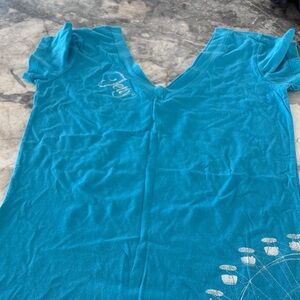 Women's Teal V-Neck Graphic Tee by No Brand Listed